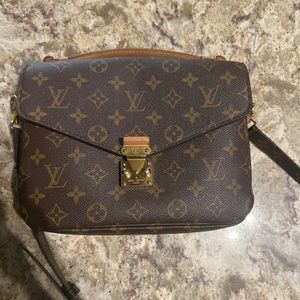 Authentic Louis Vuitton pouchette Métis